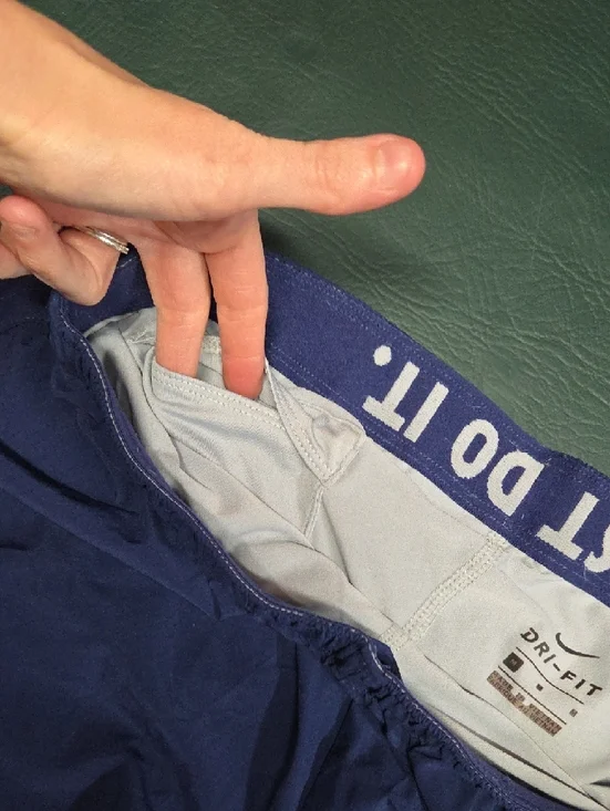 **Nike Women’s Purple Athletic Running Shorts with White Accents** - Picture 5 of 6